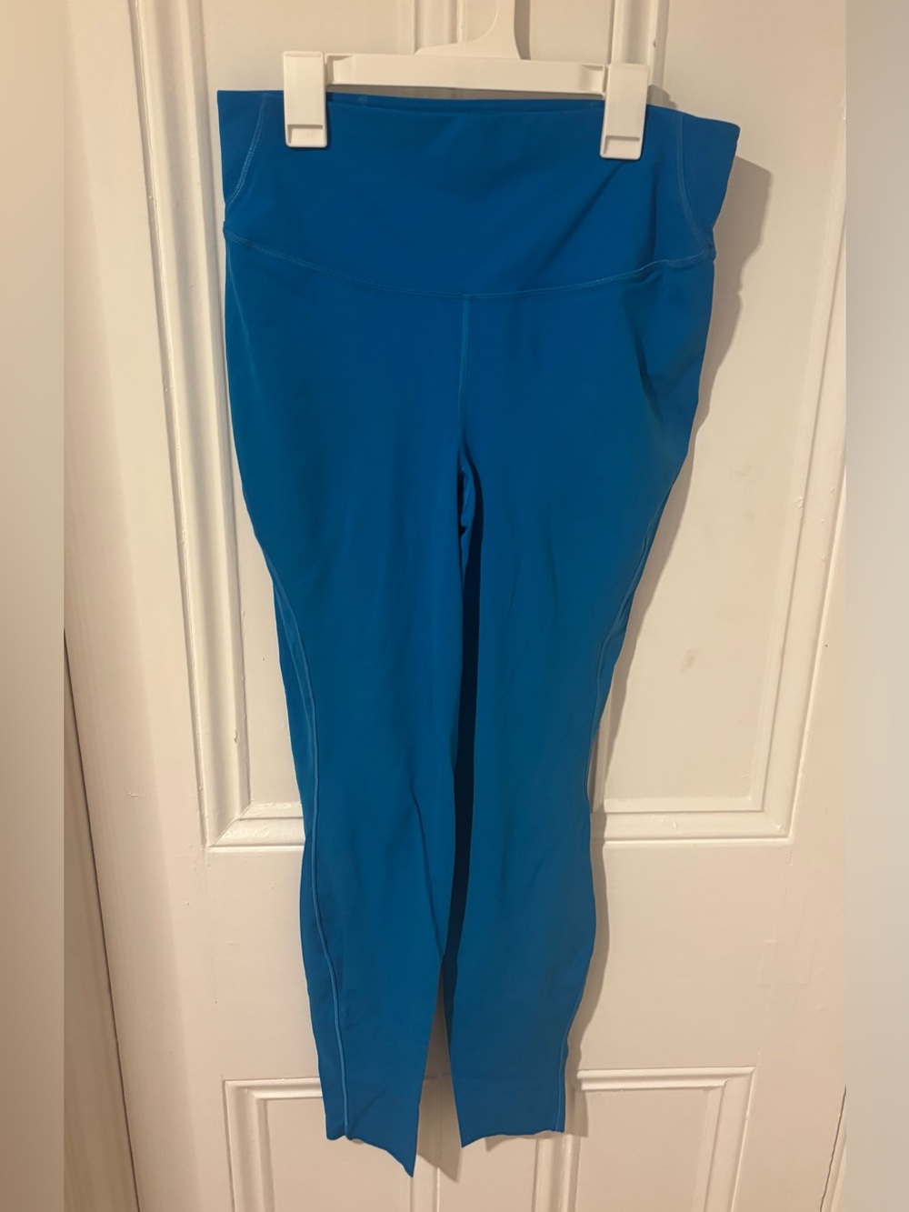 Blue women's top - likely active jersey or tank